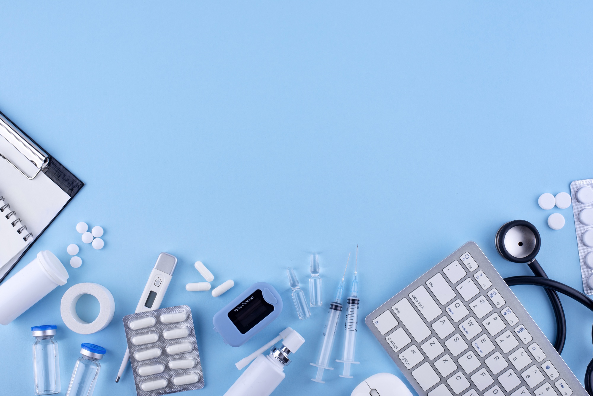 Flat lay medicine on blue background