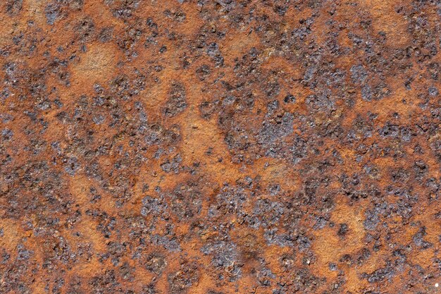 Flat lay of metal surface with rust