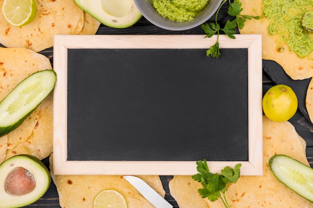 Flat lay mexican food composition with slate