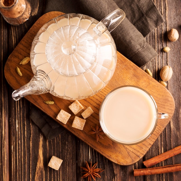 Flat lay of milk tea concept on wooden table