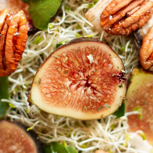 Flat lay mix of figs and nuts on plate