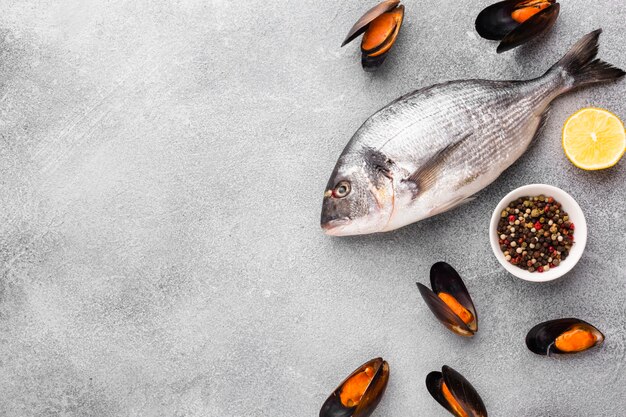 Free photo flat lay mix of seafood with condiments