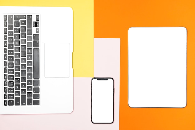 Flat lay mockup devices with colourful background