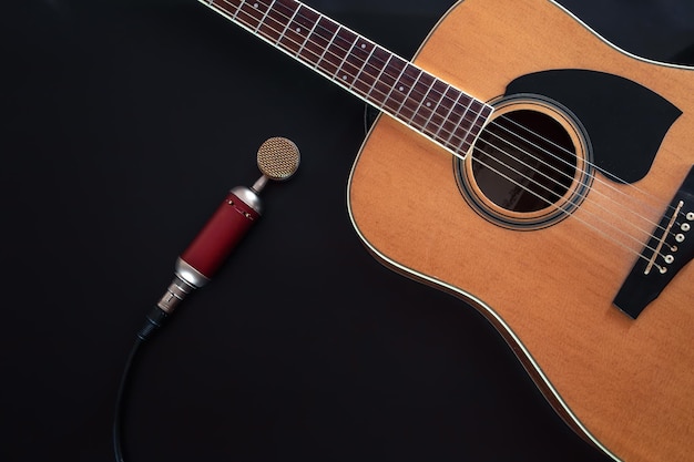 Free photo flat lay music background with acoustic guitar