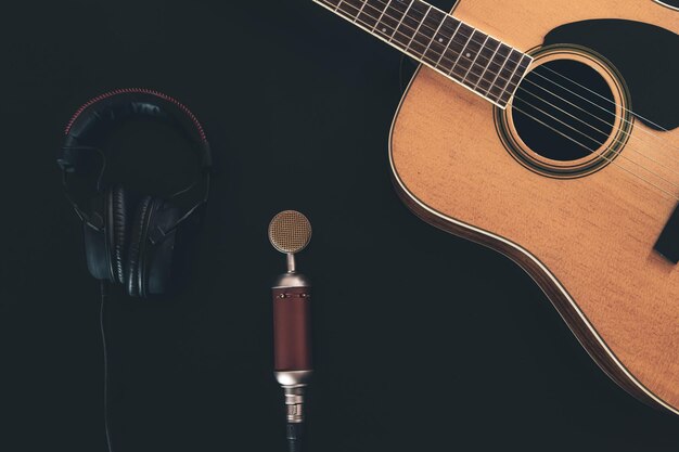 Flat lay music background with acoustic guitar