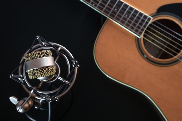 Free photo flat lay music background with acoustic guitar