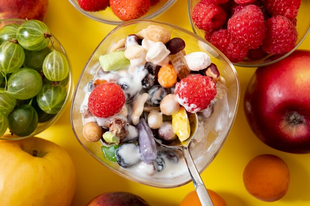 Flat lay musli and fresh fruits arrangement