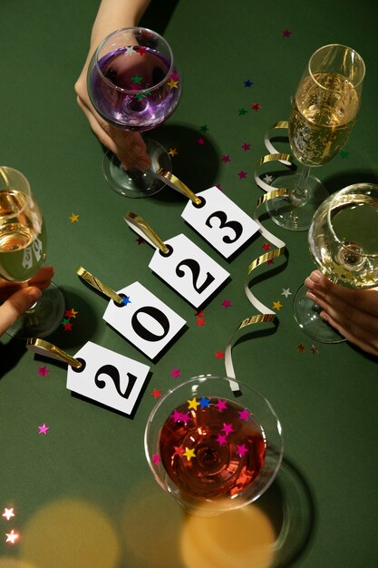 Flat lay new year drinks and ribbon