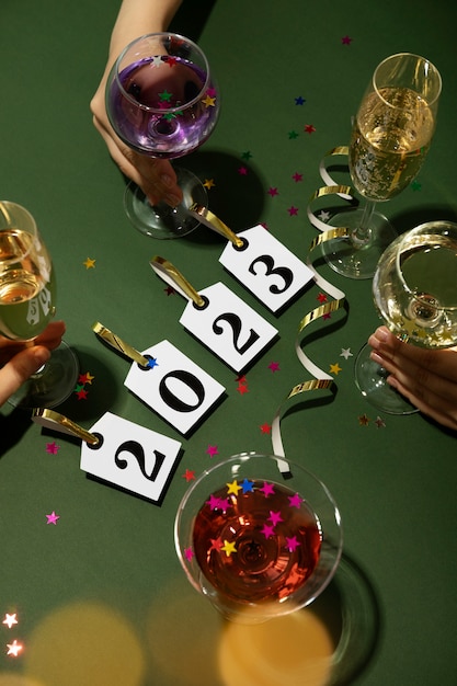 Flat lay new year drinks and ribbon