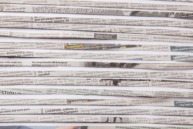 flat lay newspaper strips arrangement
