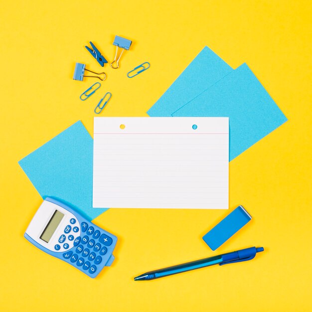 Flat lay of note mock-up with yellow background