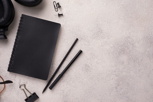 Flat lay of notebook on desk with copy space