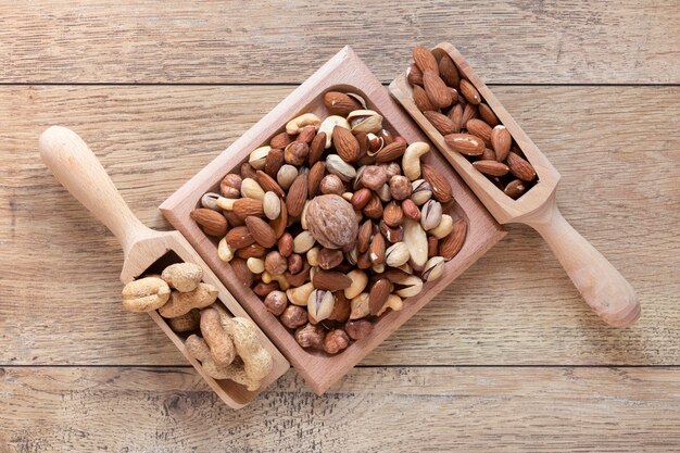 Flat lay of nuts arrangement on wooden table