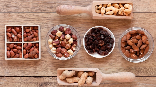 Flat lay of nuts arrangement on wooden table