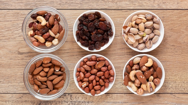 Flat lay of nuts arrangement on wooden table