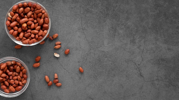 Free photo flat lay of nuts concept with copy space