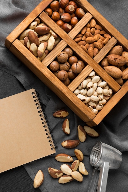 Free photo flat lay of nuts concept with copy space