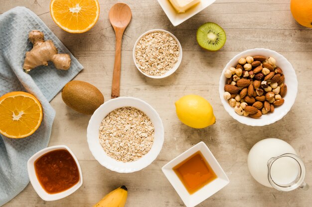 Flat lay nuts mix with fruits and oats