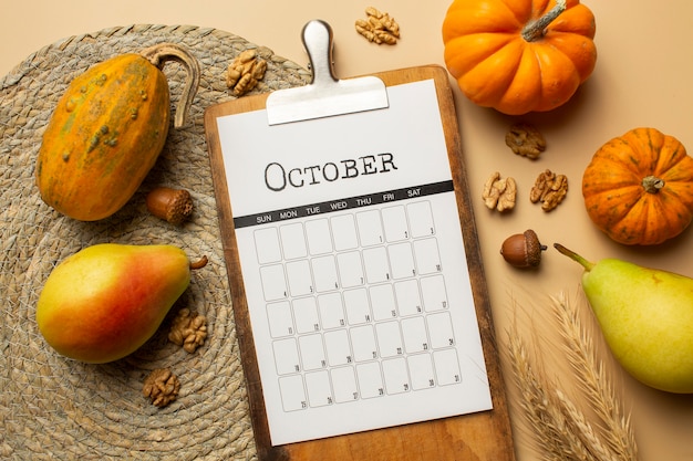 Flat lay october and pumpkins arrangement