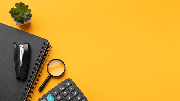 Flat lay office desk assortment with copy space