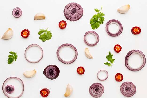 Flat lay onion rings and spices