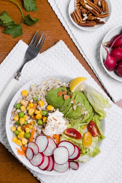 Flat lay of organic vegetables on plate