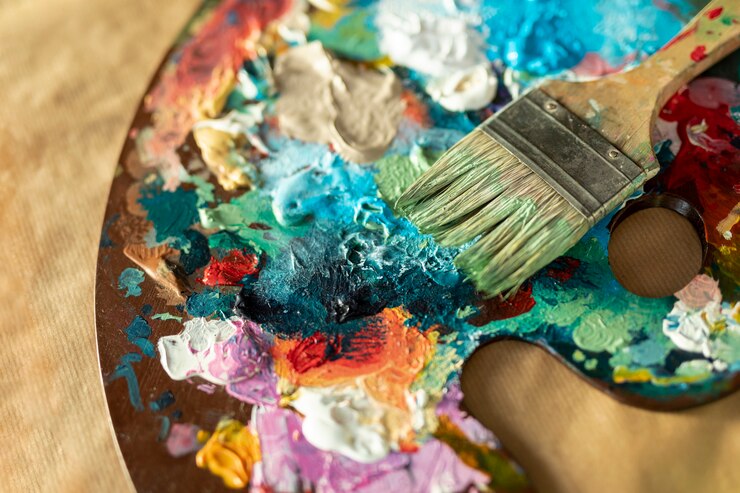Free Photo flat lay paint tray palette with brush
