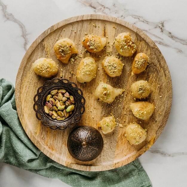 Flat lay pakistani food on wooden board