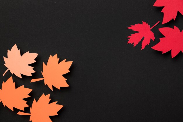 Flat lay paper autumn leaves composition with copy space