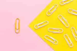 Free photo flat lay paper clip