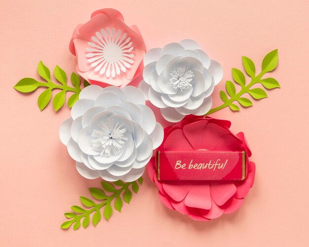 Flat lay of paper flower arrangement for women's day