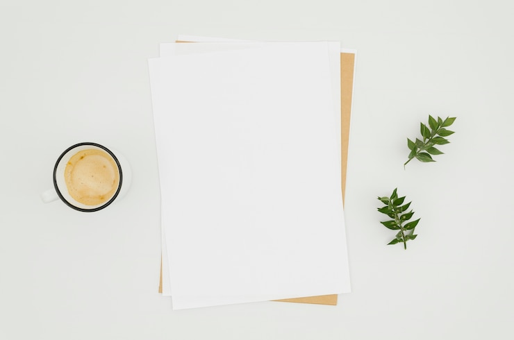 Free Photo flat lay paper mockup with floral elements