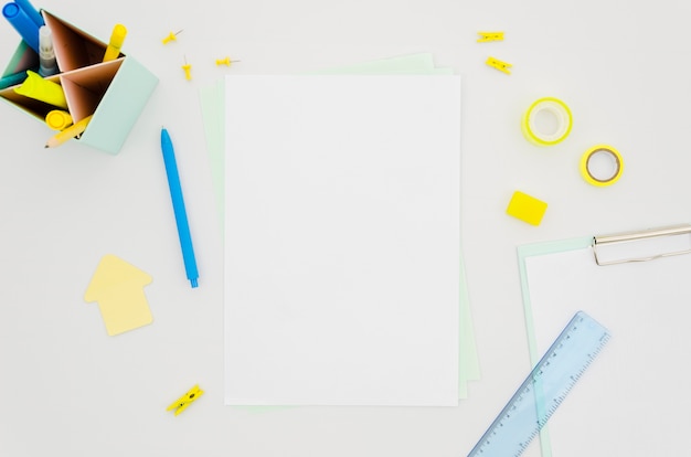 Flat lay paper mockup with office supplies