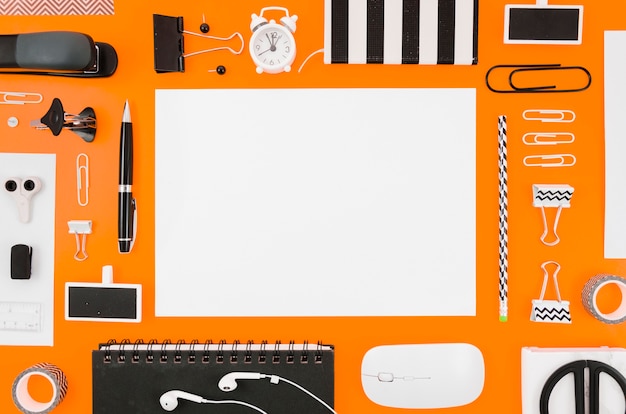 Flat lay paper mockup with office supplies