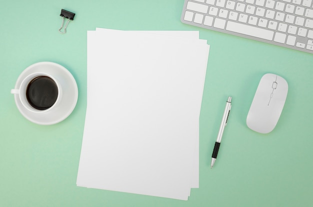 Flat lay of paper with keyboard and mouse