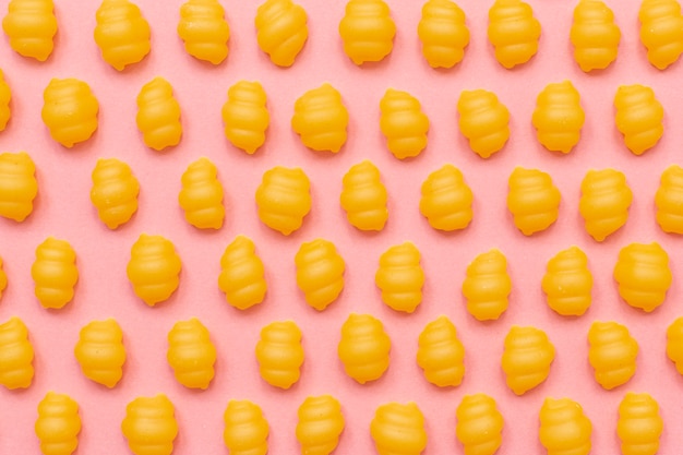 Flat lay of pasta arrangement on plain background