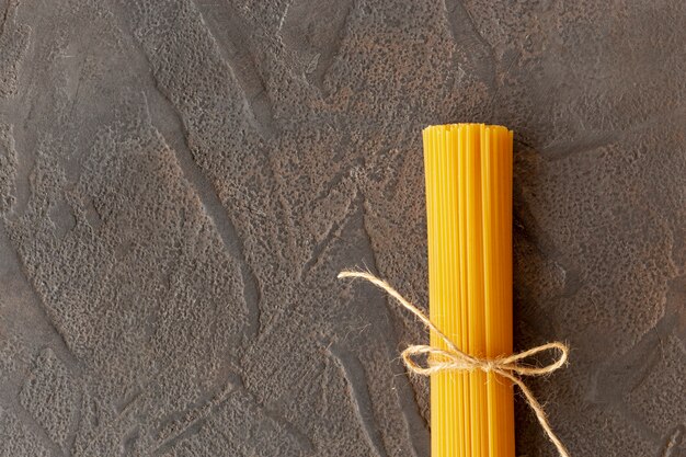 Flat lay of pasta on plain background