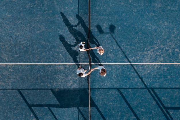 Flat lay people playing paddle tennis