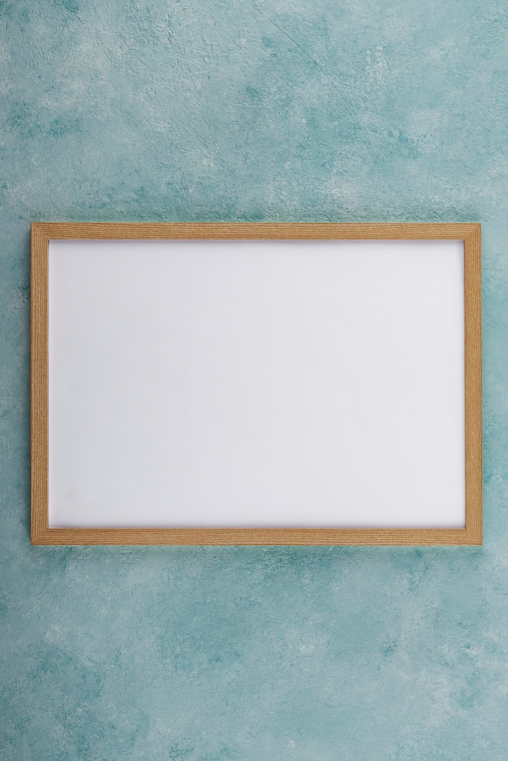 Free Photo flat lay of photo frame on textured surface