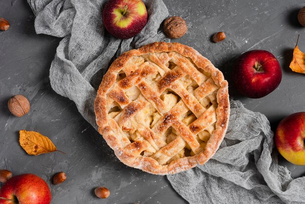 Flat lay of pie and apples