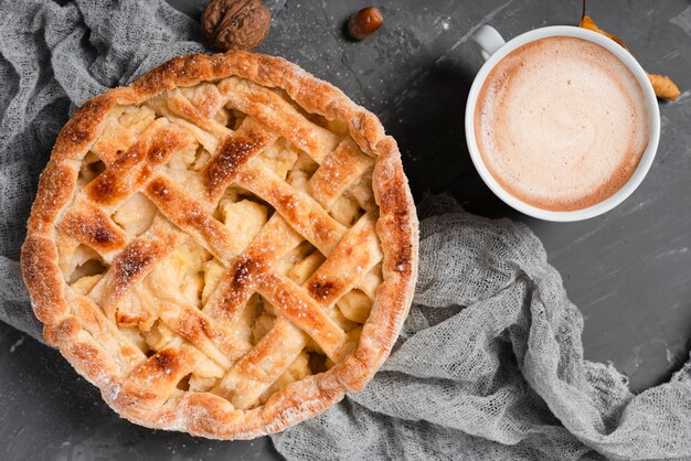 Flat lay of pie and coffee