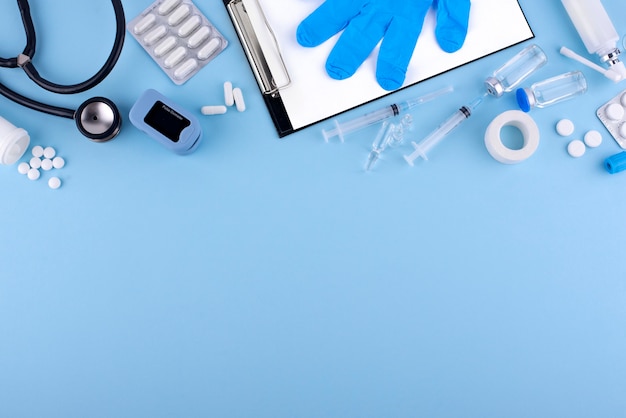 Flat lay pills and stethoscope arrangement