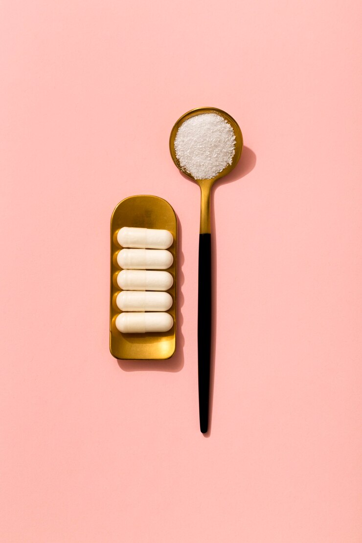 Free Photo flat lay of pills with spoon of crushed medicine