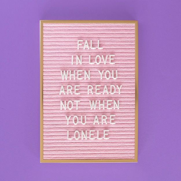Flat lay pink board with message