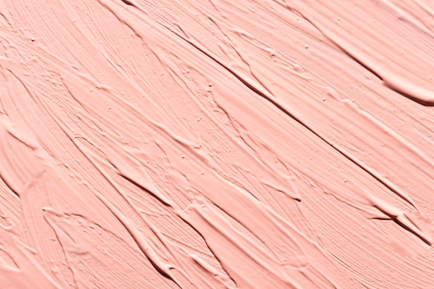 Flat lay of pink paint brush strokes on surface