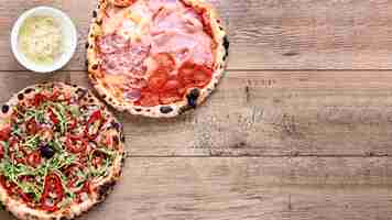 Free photo flat lay pizza frame with copy-space