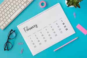 Free photo flat lay planner february calendar
