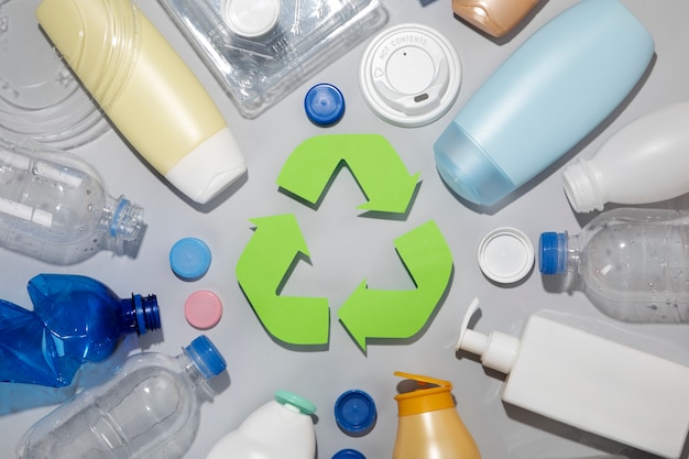 Flat lay plastic bottles arrangement