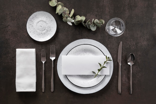 Flat lay plates, cutlery and glass