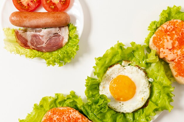 Flat lay protein breakfast arrangement on plain background